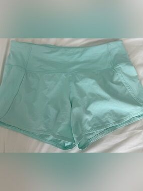 Lululemon Shorts With Liner Color Toothpaste Run Times Short 4" Sz.4